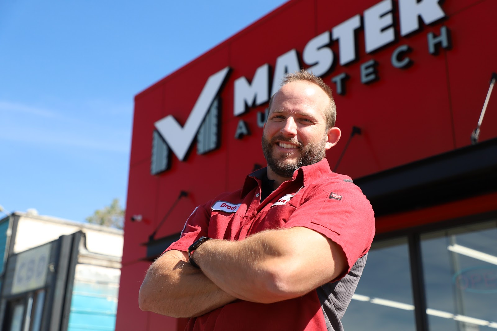 Brody Eaton outside a rebranded Master AutoTech store